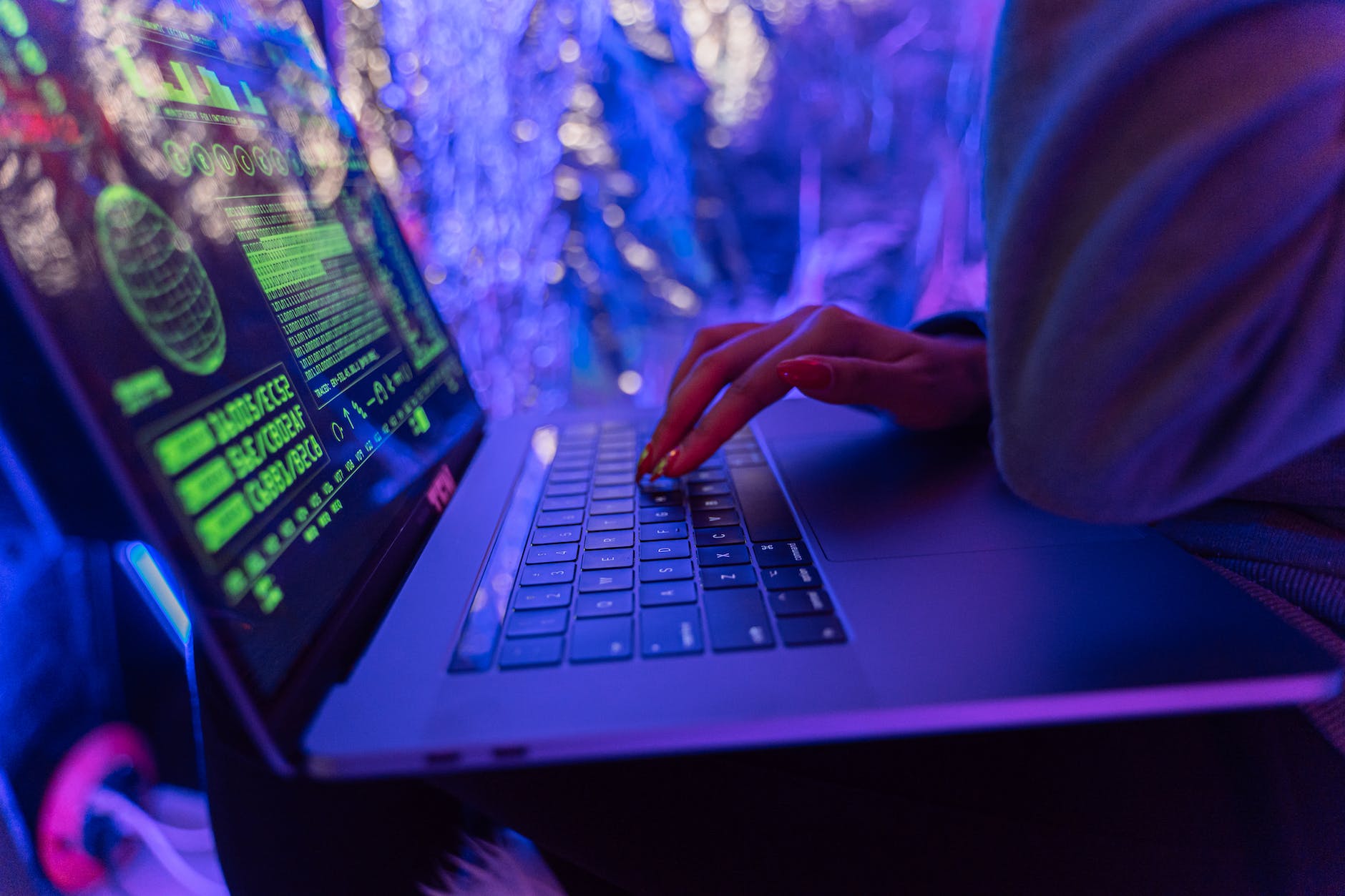 person using black laptop computer